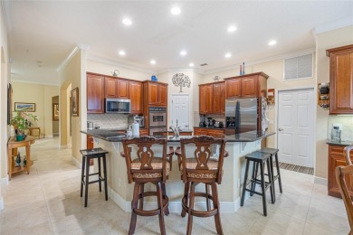 Magnificent 6-Bedroom Pool Home with Golf Course Views in on Magnolia Plantation Golf Club in Florida - for sale on GolfHomes.com, golf home, golf lot