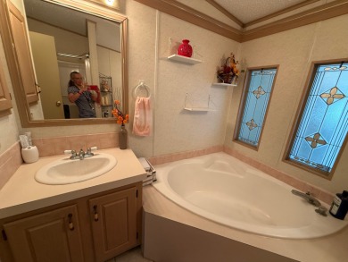 This is the house you have been waiting for with a 2022 Roof on Whisperwood Golf Course in Florida - for sale on GolfHomes.com, golf home, golf lot