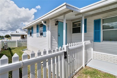 GOLF CART INCLUDED Beautifully updated split-bedroom home on Barefoot Bay Golf Course in Florida - for sale on GolfHomes.com, golf home, golf lot