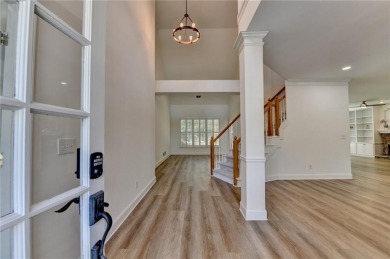 Discover a meticulously designed home that seamlessly blends on Canongate At Olde Atlanta Golf Club in Georgia - for sale on GolfHomes.com, golf home, golf lot