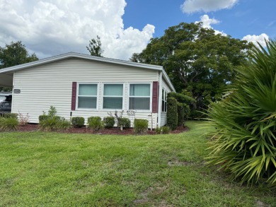 This is the house you have been waiting for with a 2022 Roof on Whisperwood Golf Course in Florida - for sale on GolfHomes.com, golf home, golf lot