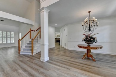 Discover a meticulously designed home that seamlessly blends on Canongate At Olde Atlanta Golf Club in Georgia - for sale on GolfHomes.com, golf home, golf lot