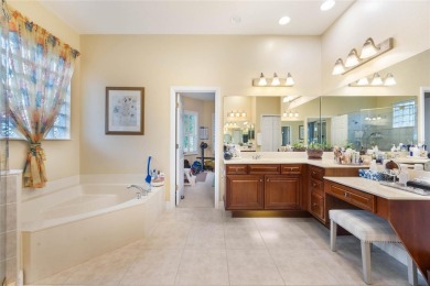 Magnificent 6-Bedroom Pool Home with Golf Course Views in on Magnolia Plantation Golf Club in Florida - for sale on GolfHomes.com, golf home, golf lot