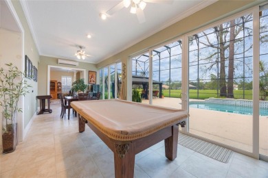 Magnificent 6-Bedroom Pool Home with Golf Course Views in on Magnolia Plantation Golf Club in Florida - for sale on GolfHomes.com, golf home, golf lot