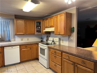 Welcome to Tamiami Village! Location is Great! Rare corner lot on Six Lakes Country Club in Florida - for sale on GolfHomes.com, golf home, golf lot