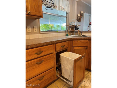 Welcome to Tamiami Village! Location is Great! Rare corner lot on Six Lakes Country Club in Florida - for sale on GolfHomes.com, golf home, golf lot