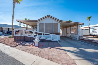 Corner Lot Retreat with Deck and Spacious Bonus Room in on Riverview Golf Course in Arizona - for sale on GolfHomes.com, golf home, golf lot