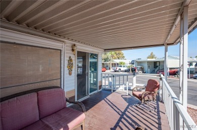 Corner Lot Retreat with Deck and Spacious Bonus Room in on Riverview Golf Course in Arizona - for sale on GolfHomes.com, golf home, golf lot