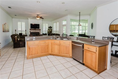 Check out this inviting 4-bedroom, 3-bath home nestled on just on Turkey Creek Golf and Country Club in Florida - for sale on GolfHomes.com, golf home, golf lot