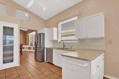 SWEEPING, EXPANSIVE GOLF & WATER VIEW in PGA Village! on The Legacy Golf and Tennis Club in Florida - for sale on GolfHomes.com, golf home, golf lot