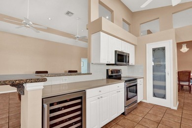 SWEEPING, EXPANSIVE GOLF & WATER VIEW in PGA Village! on The Legacy Golf and Tennis Club in Florida - for sale on GolfHomes.com, golf home, golf lot