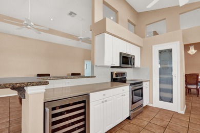 SWEEPING, EXPANSIVE GOLF & WATER VIEW in PGA Village! on The Legacy Golf and Tennis Club in Florida - for sale on GolfHomes.com, golf home, golf lot