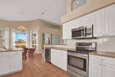 SWEEPING, EXPANSIVE GOLF & WATER VIEW in PGA Village! on The Legacy Golf and Tennis Club in Florida - for sale on GolfHomes.com, golf home, golf lot