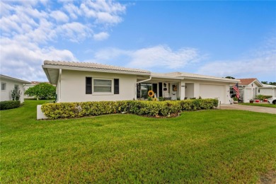 Welcome to this beautifully maintained 2-bedroom, 2-bath home on Mainlands Golf Club in Florida - for sale on GolfHomes.com, golf home, golf lot