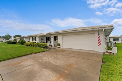 Welcome to this beautifully maintained 2-bedroom, 2-bath home on Mainlands Golf Club in Florida - for sale on GolfHomes.com, golf home, golf lot