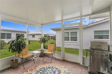 Welcome to this beautifully maintained 2-bedroom, 2-bath home on Mainlands Golf Club in Florida - for sale on GolfHomes.com, golf home, golf lot