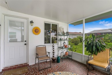 Welcome to this beautifully maintained 2-bedroom, 2-bath home on Mainlands Golf Club in Florida - for sale on GolfHomes.com, golf home, golf lot