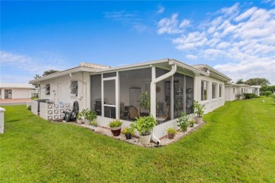 Welcome to this beautifully maintained 2-bedroom, 2-bath home on Mainlands Golf Club in Florida - for sale on GolfHomes.com, golf home, golf lot