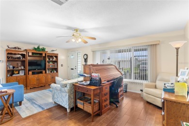 Welcome to this beautifully maintained 2-bedroom, 2-bath home on Mainlands Golf Club in Florida - for sale on GolfHomes.com, golf home, golf lot