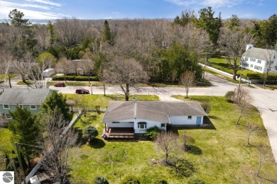 Ideal downtown Charlevoix location! This single level ranch home on Charlevoix Golf Club in Michigan - for sale on GolfHomes.com, golf home, golf lot