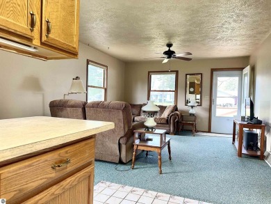 This home comes with shared, deeded frontage with private dock on Birch Pointe Golf Club in Michigan - for sale on GolfHomes.com, golf home, golf lot