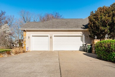 Custom European-style stucco and stone home in a 18-hole golf on Madisonville Golf and Country Club in Kentucky - for sale on GolfHomes.com, golf home, golf lot