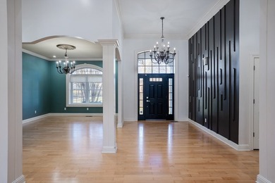 Custom European-style stucco and stone home in a 18-hole golf on Madisonville Golf and Country Club in Kentucky - for sale on GolfHomes.com, golf home, golf lot