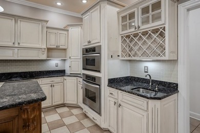 Custom European-style stucco and stone home in a 18-hole golf on Madisonville Golf and Country Club in Kentucky - for sale on GolfHomes.com, golf home, golf lot