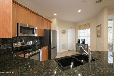 Welcome to this beautifully maintained townhome located in the on LPGA International Golf Course in Florida - for sale on GolfHomes.com, golf home, golf lot