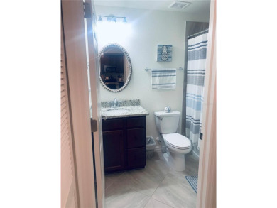 GOLFER'S DREAM!! This exceptional condo is just yards away from on Lakewood National Golf Club in Florida - for sale on GolfHomes.com, golf home, golf lot