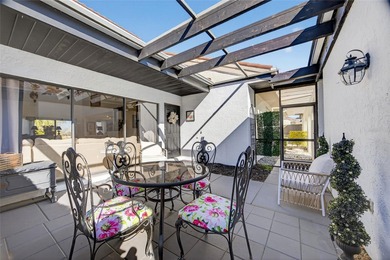 BEAUTIFULLY UPDATED AND MOVE-IN READY, THIS 2-BEDROOM, 2-BATH on Twin Isles Country Club in Florida - for sale on GolfHomes.com, golf home, golf lot