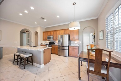 Modern updates welcome you as you step through the front door of on Venetian Golf and River Club in Florida - for sale on GolfHomes.com, golf home, golf lot