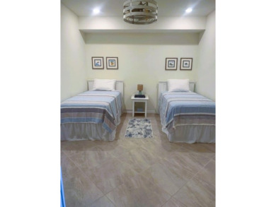 GOLFER'S DREAM!! This exceptional condo is just yards away from on Lakewood National Golf Club in Florida - for sale on GolfHomes.com, golf home, golf lot