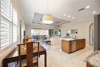 Modern updates welcome you as you step through the front door of on Venetian Golf and River Club in Florida - for sale on GolfHomes.com, golf home, golf lot