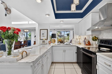 BEAUTIFULLY UPDATED AND MOVE-IN READY, THIS 2-BEDROOM, 2-BATH on Twin Isles Country Club in Florida - for sale on GolfHomes.com, golf home, golf lot