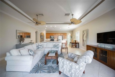 Modern updates welcome you as you step through the front door of on Venetian Golf and River Club in Florida - for sale on GolfHomes.com, golf home, golf lot