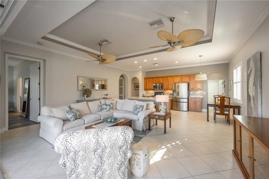 Modern updates welcome you as you step through the front door of on Venetian Golf and River Club in Florida - for sale on GolfHomes.com, golf home, golf lot