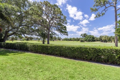 This single-level home with a BRAND NEW ROOF has soaring vaulted on The Golf Club of Jupiter in Florida - for sale on GolfHomes.com, golf home, golf lot