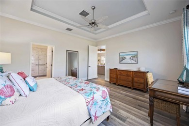 Modern updates welcome you as you step through the front door of on Venetian Golf and River Club in Florida - for sale on GolfHomes.com, golf home, golf lot