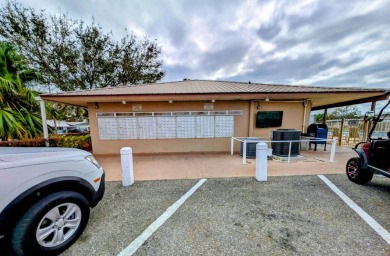 OWNER WILL CONSIDER FINANCING OPTION! Palm trees line the front on Grasslands Golf and Country Club in Florida - for sale on GolfHomes.com, golf home, golf lot