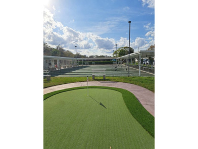 OWNER WILL CONSIDER FINANCING OPTION! Palm trees line the front on Grasslands Golf and Country Club in Florida - for sale on GolfHomes.com, golf home, golf lot