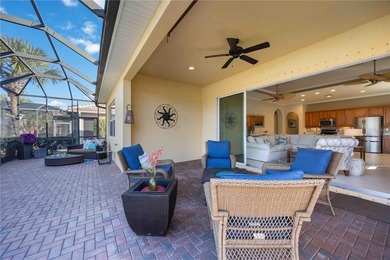 Modern updates welcome you as you step through the front door of on Venetian Golf and River Club in Florida - for sale on GolfHomes.com, golf home, golf lot