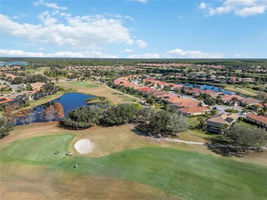 Modern updates welcome you as you step through the front door of on Venetian Golf and River Club in Florida - for sale on GolfHomes.com, golf home, golf lot