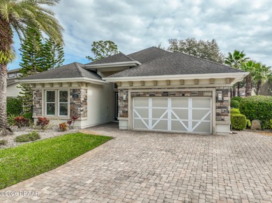 Welcome to this beautifully appointed 3-bedroom, 2-bath home on Plantation Bay Golf and Country Club in Florida - for sale on GolfHomes.com, golf home, golf lot