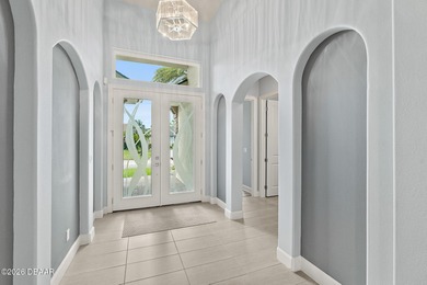 Welcome to this beautifully appointed 3-bedroom, 2-bath home on Plantation Bay Golf and Country Club in Florida - for sale on GolfHomes.com, golf home, golf lot