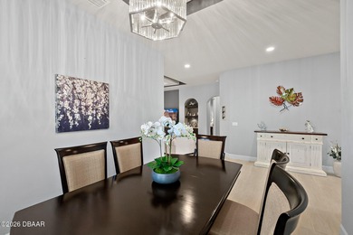 Welcome to this beautifully appointed 3-bedroom, 2-bath home on Plantation Bay Golf and Country Club in Florida - for sale on GolfHomes.com, golf home, golf lot