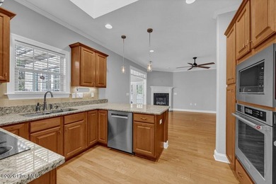 This meticulously maintained all-brick townhome, tucked away on on Cape Fear National At Brunswick Forest in North Carolina - for sale on GolfHomes.com, golf home, golf lot