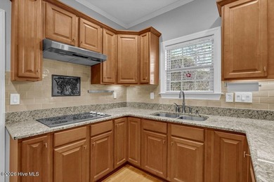 This meticulously maintained all-brick townhome, tucked away on on Cape Fear National At Brunswick Forest in North Carolina - for sale on GolfHomes.com, golf home, golf lot