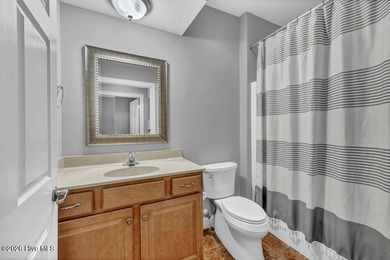 This meticulously maintained all-brick townhome, tucked away on on Cape Fear National At Brunswick Forest in North Carolina - for sale on GolfHomes.com, golf home, golf lot