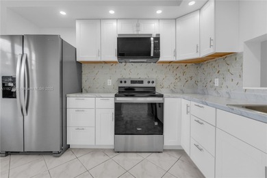 BEST LAKE VIEW & TASTEFULLY REMODELED!!! in Century Village on Flamingo Lakes Country Club in Florida - for sale on GolfHomes.com, golf home, golf lot